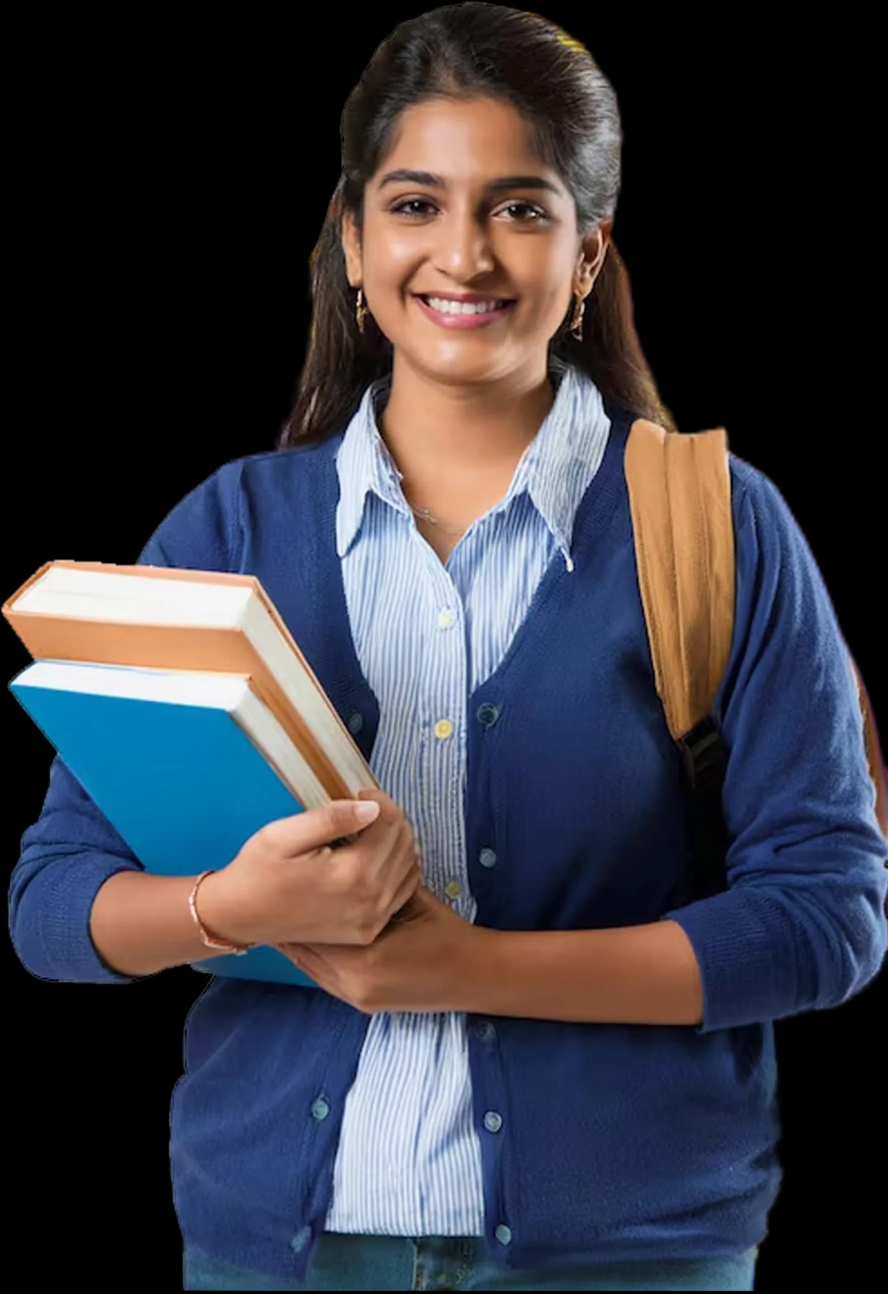 A student of Eklavya Mahila College holding her books