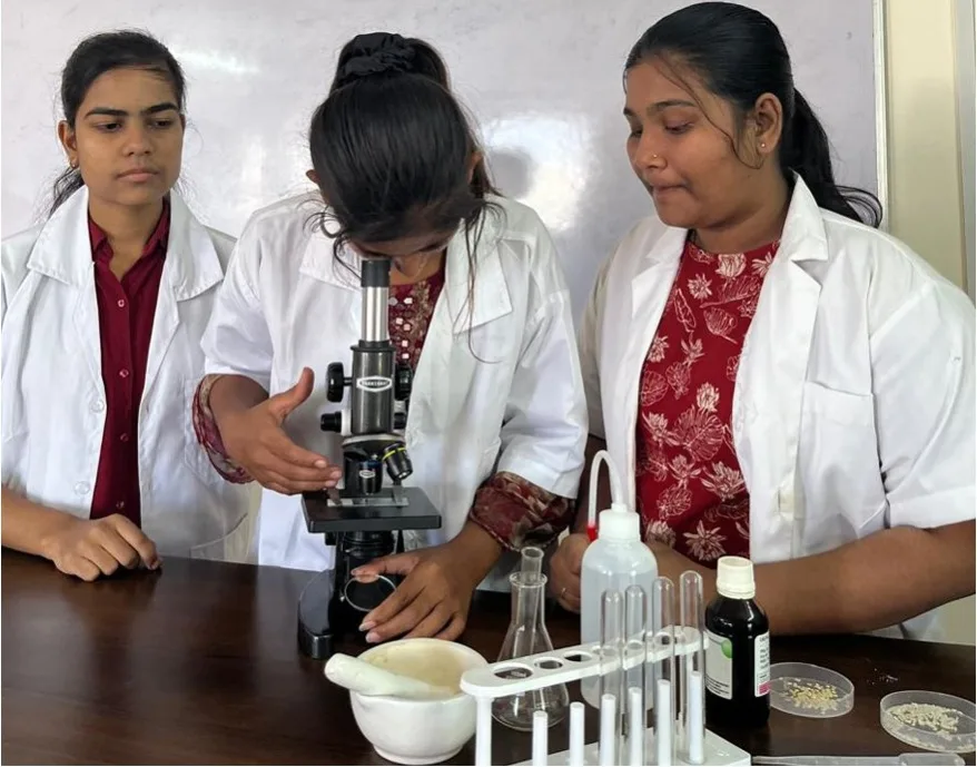 Clinical Laboratory Science students at the microscope